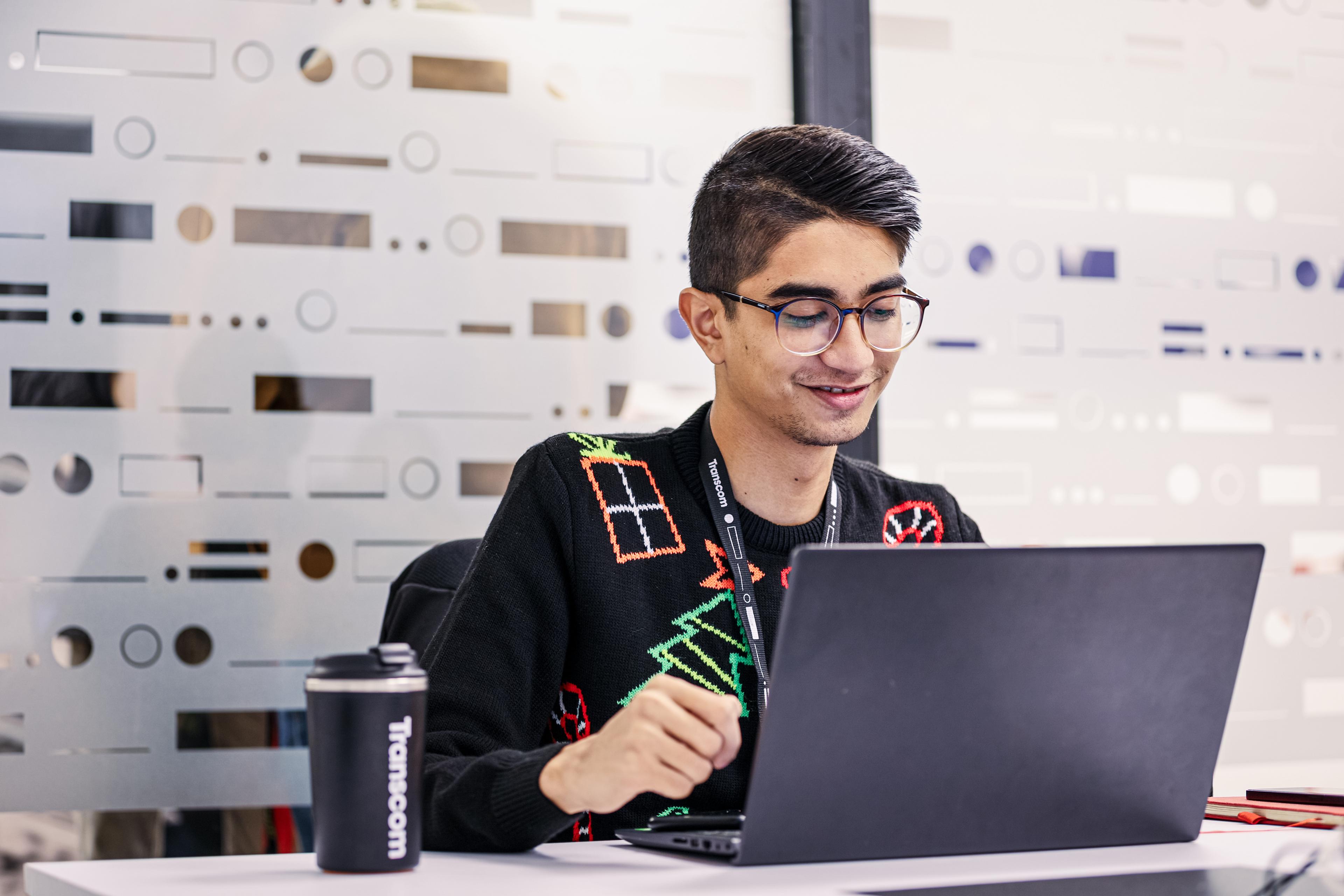 Transcom app open in laptop